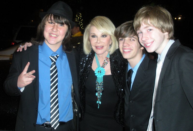 Joan Rivers with Joey Luthman and Brandon Tyler Russell at the QVC Oscar Party in March 2011.