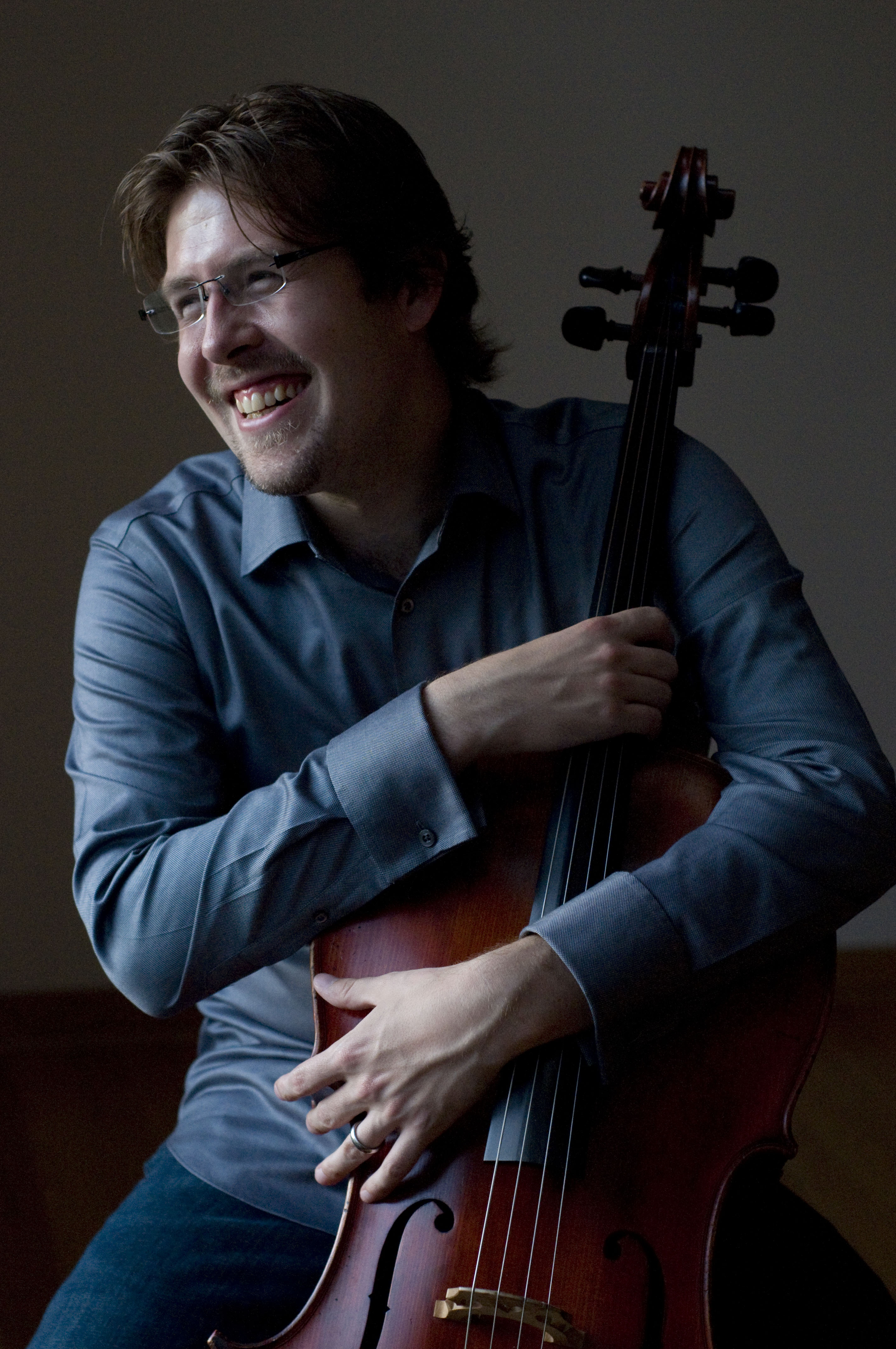Composer Chris Thomas, with cello