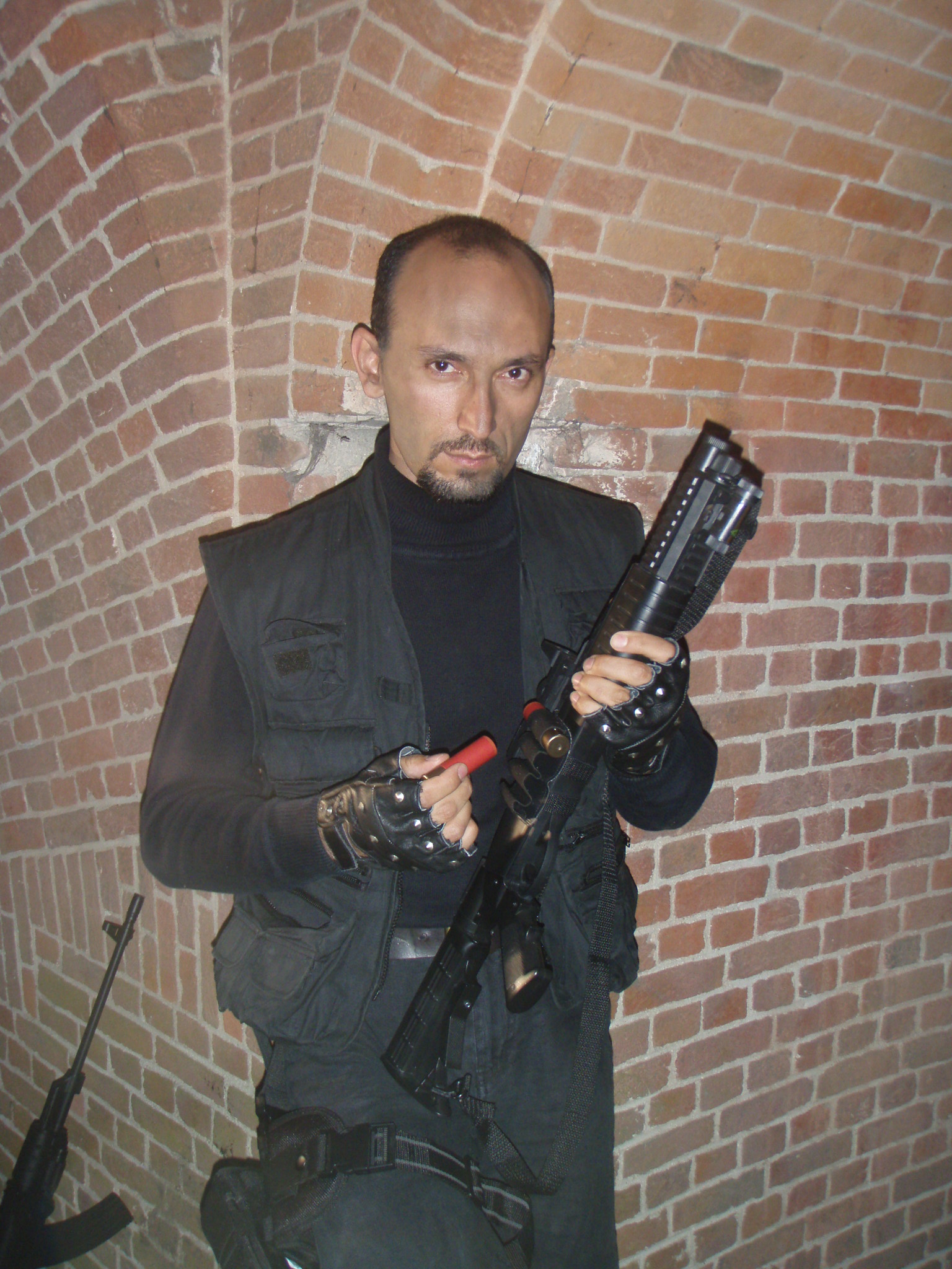 Cela Yildiz as The Gatewatcher in Demon Games.
