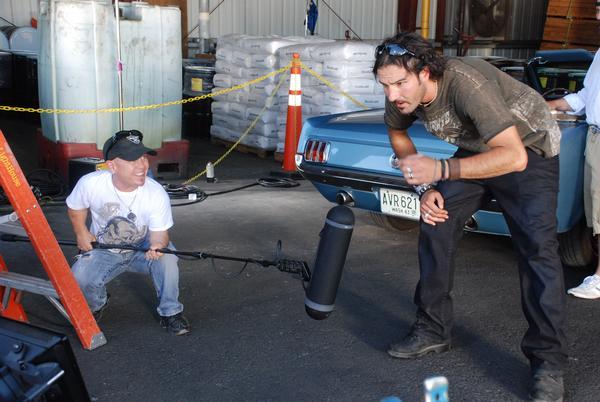 Marty Klebba Playing sound man on set. I think he was looking for another credit. LOL..