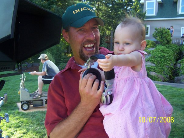 Rob and daughter, Breven Holloway. Breven is telling Lee Arenberg, 