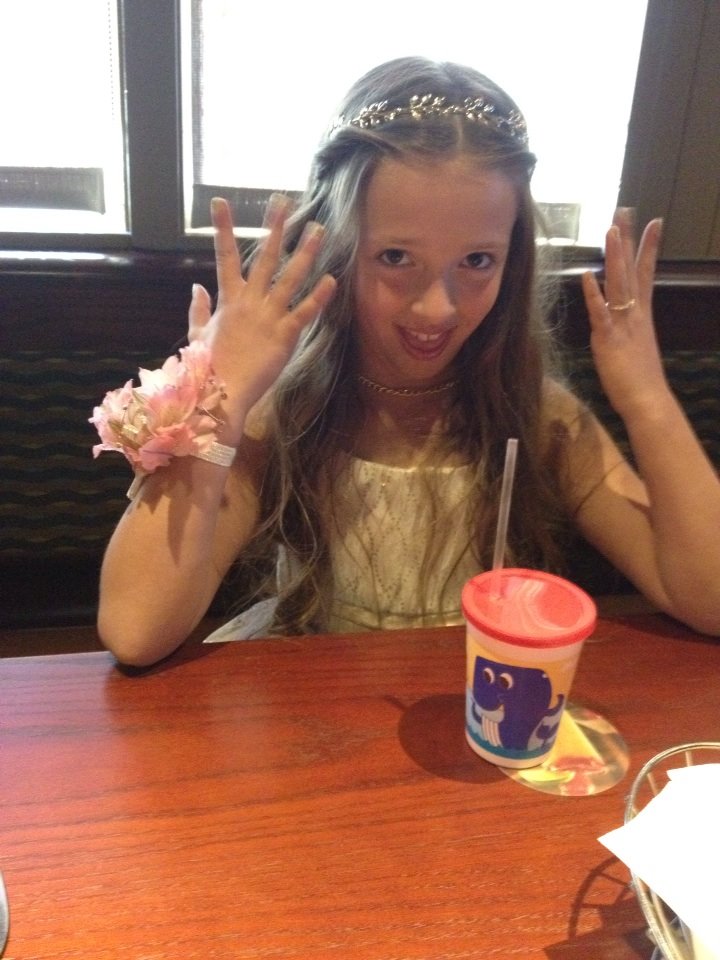 Malia at the Father Daughter Dinner. Check out my nails...