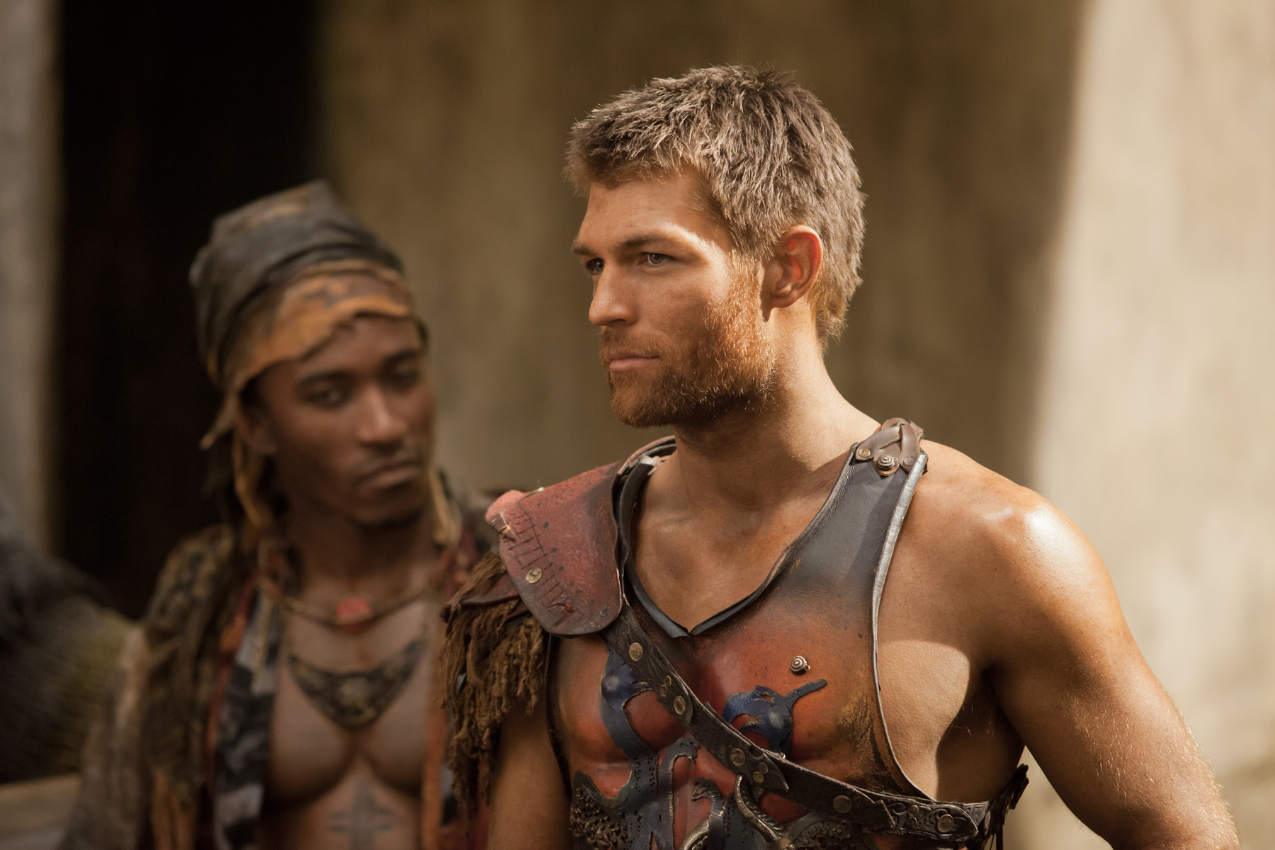Still of Liam McIntyre and Blessing Mokgohloa in Spartacus: Blood and Sand (2010)