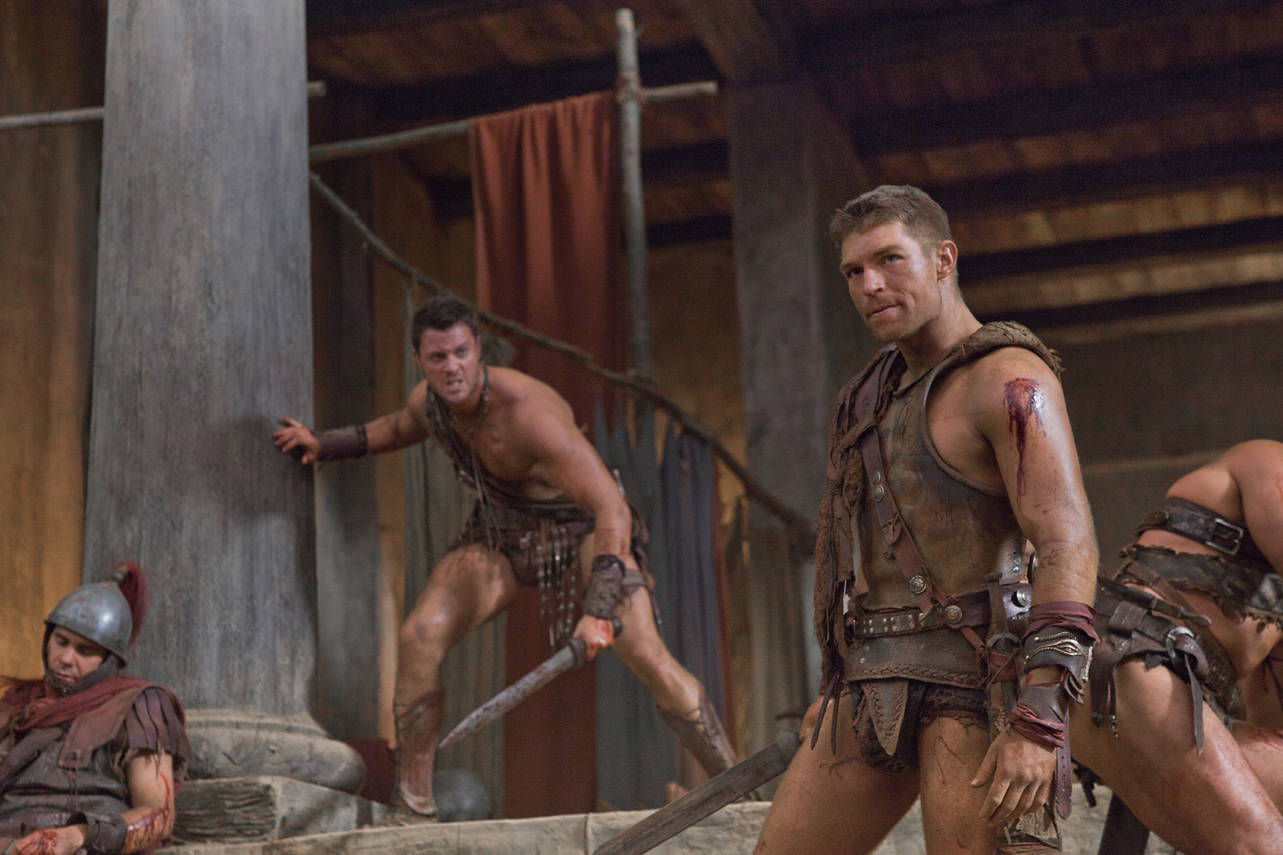 Still of Daniel Feuerriegel and Liam McIntyre in Spartacus: Blood and Sand (2010)