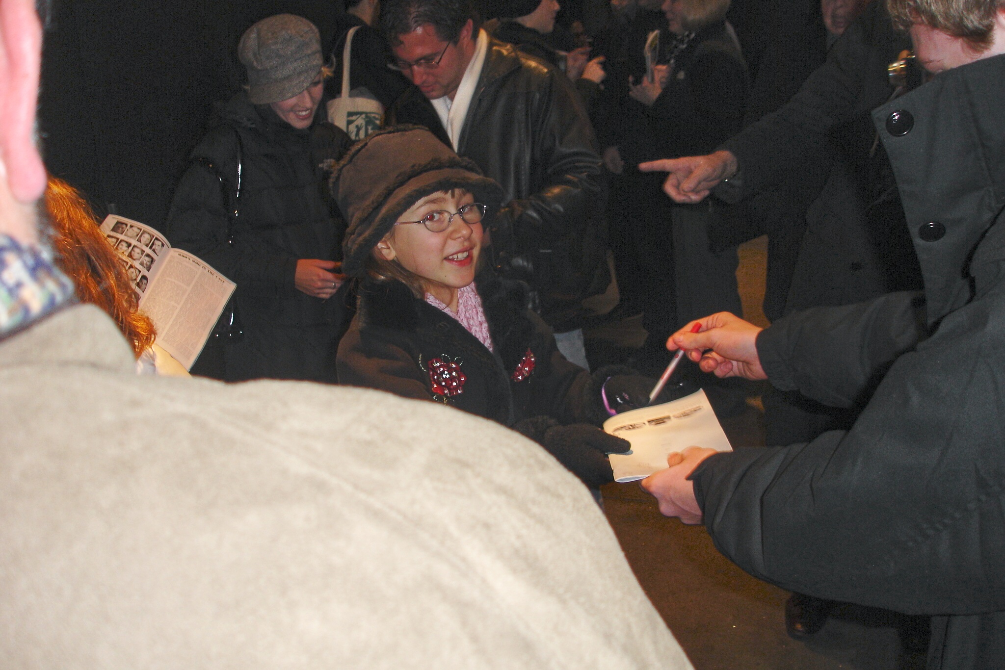 signing autographs at the Broadway Marriott Marquis stage door.