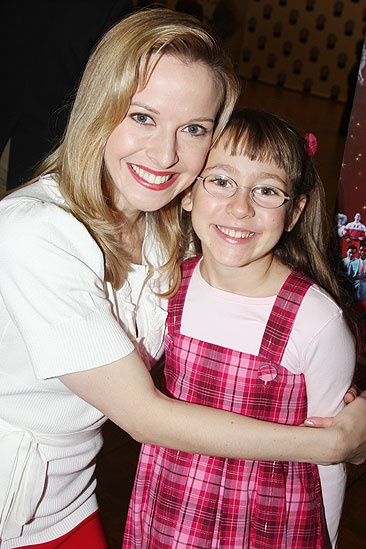Meredith Patterson snaps an adorable pic with the show's youngest seasonal reveler, Melody Hollis.