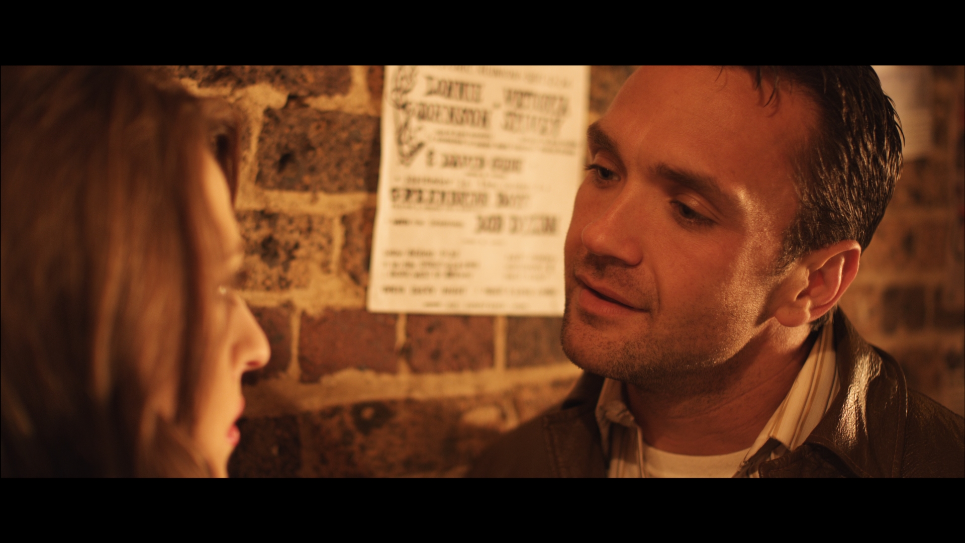 still of Delfina Alden and Gary Hilborn in Anya (2012)