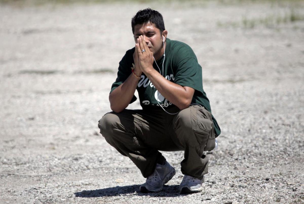 Amardeep on August 5th, 2012 praying for his mother and father to survive the Sikh Temple of Wisconsin attack.