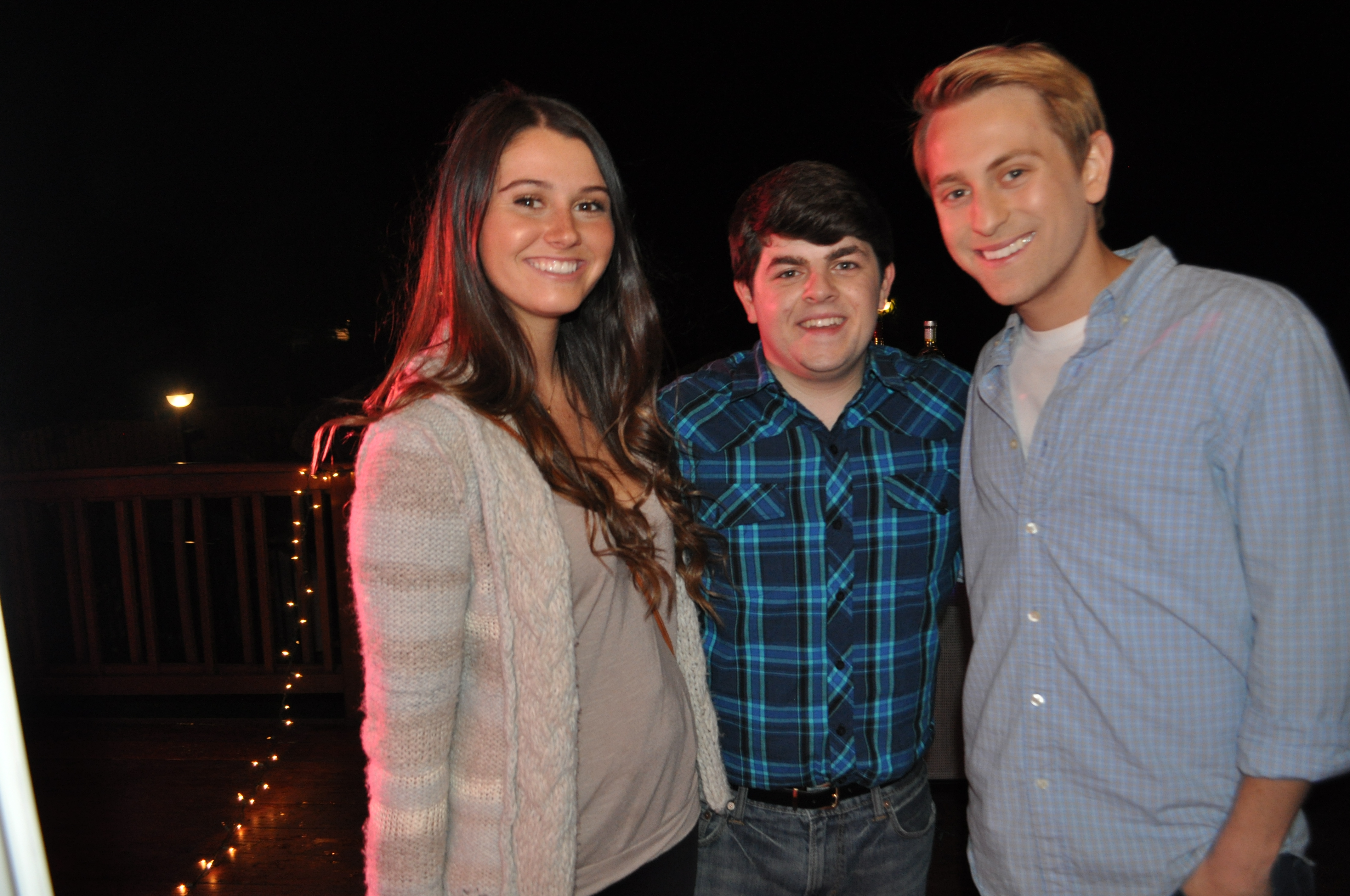 Courtney Baxter, Josh Flitter and Eric Nelsen on the set of 