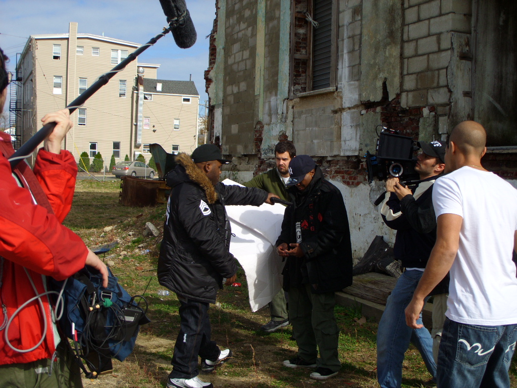 Image of a behind the scenes shot of the film 