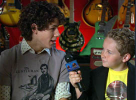 Disney's Really Short Report The Jonas Brothers on set being interviewed by Jacob Hays as Sonny Raines