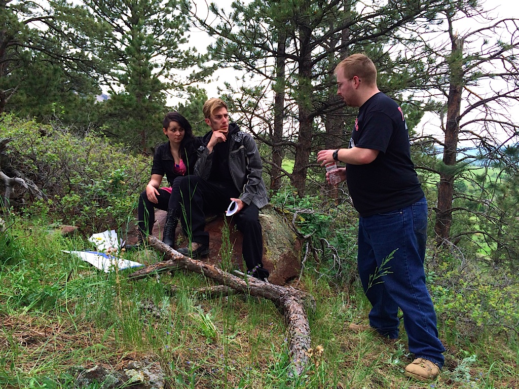 Director Josh Lindquist with Jessica Ortner and Kristofer Warbritton on the set of Zero (2014).