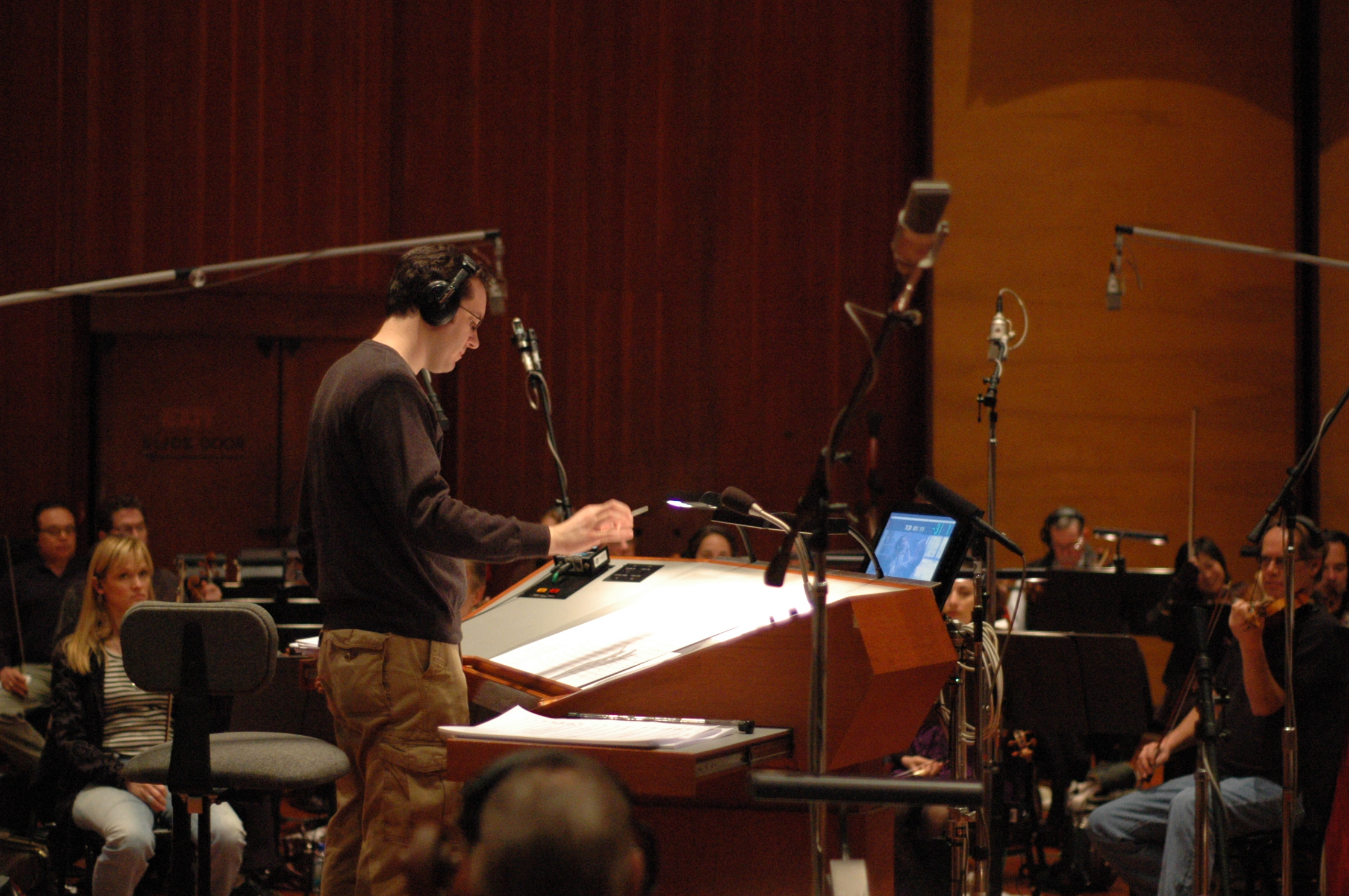 David and Fatima scoring session, conducting the Hollywood Studio Symphony Orchestra