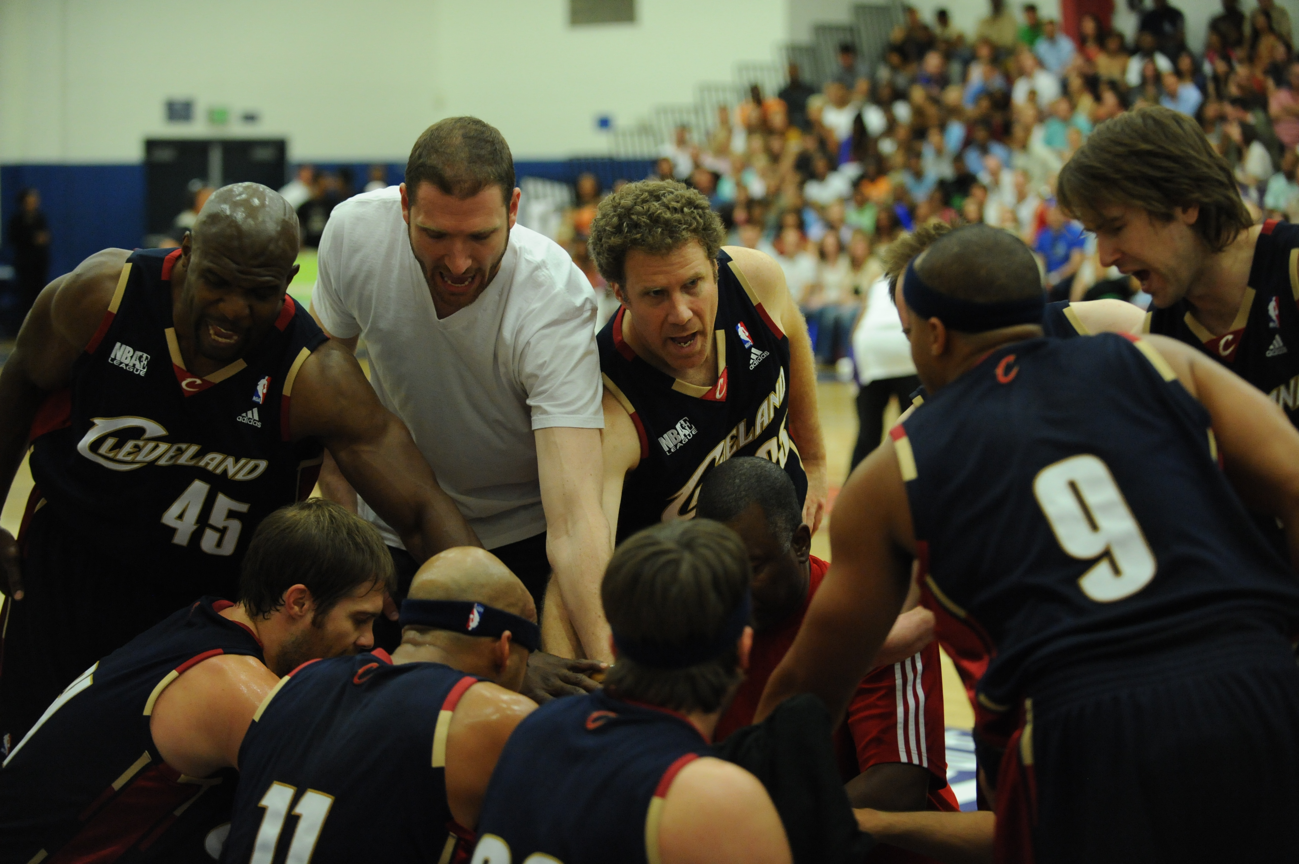 Terry Crews, Peter Cornell, Will Ferrell, Michael Westphal, Donald Faison, Josh Braaten, James Lesure and Geoff Stults break from a huddle in the NBAE League championship game