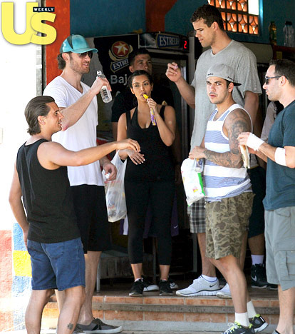 Peter Cornell, Scott Disick, Kris Humphries, Kim Kardashian, Rob Kardashian and friends get a snack in Mexico while out and about on vacation.
