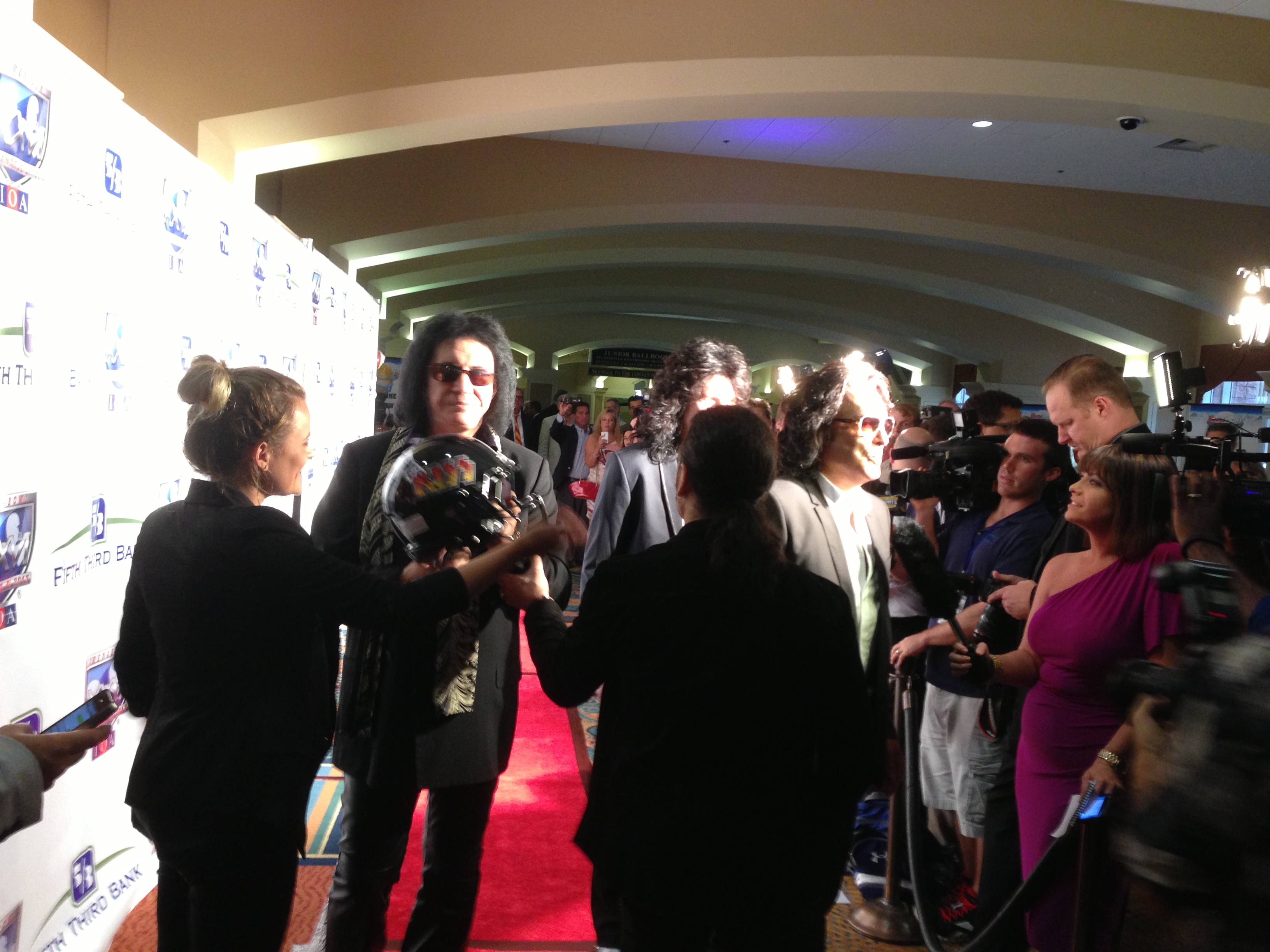 Gene Simmons and the rest of the of KISS on the red carpet at the 2013 AFL's Annual Awards Gala Ryan produced. KISS performed a 30 minute acoustic set at the Gala and Ryan went on to produce ArenaBowl XXVI and the KISS concert in Orlando that week.