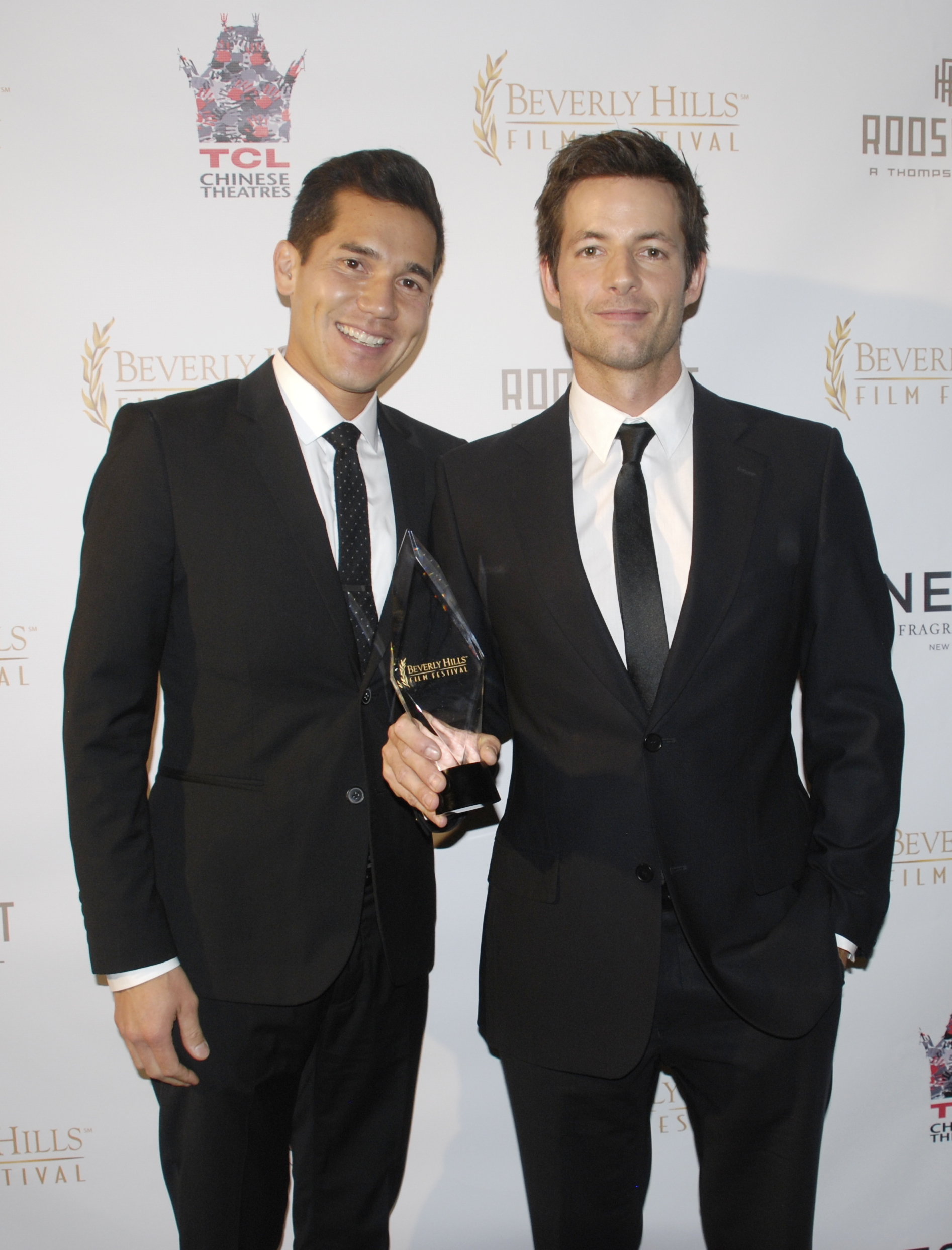 Scotty Crowe and Philipp Karner (DIVING NORMAL) receive the award for Best Feature at the Beverly Hills Film Festival.
