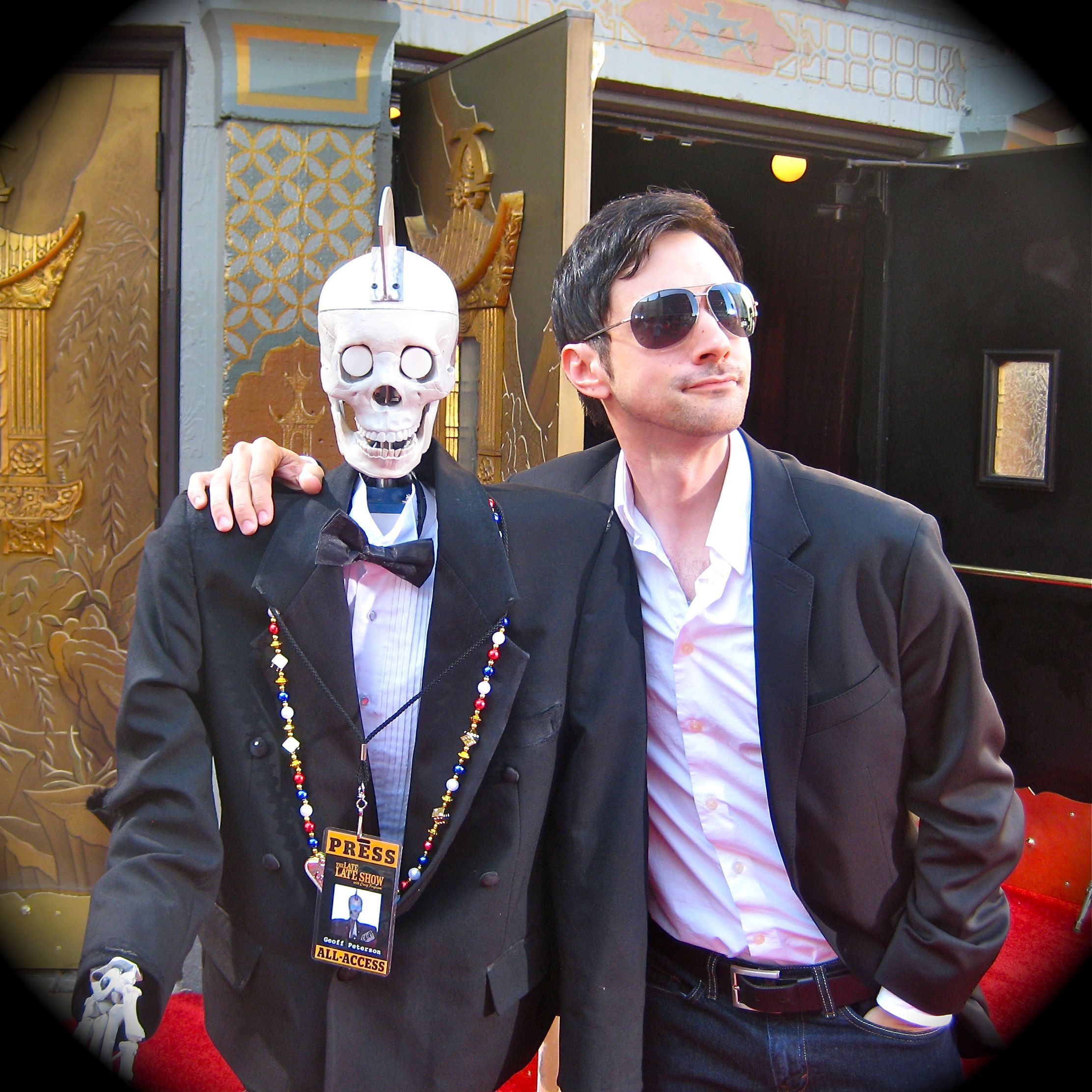 Josh Robert Thompson with his robot alter-ego, Geoff Peterson, on the red carpet.
