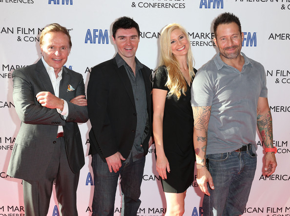 SANTA MONICA, CA - NOVEMBER 06: (L-R) Producer Craigar L. Grosvenor, Director Timothy Woodward Jr., Sales Agent Kristine Kreska, and actor Johnny Messner, attend The 2014 American Film Market (AFM) with film Decommissioned.