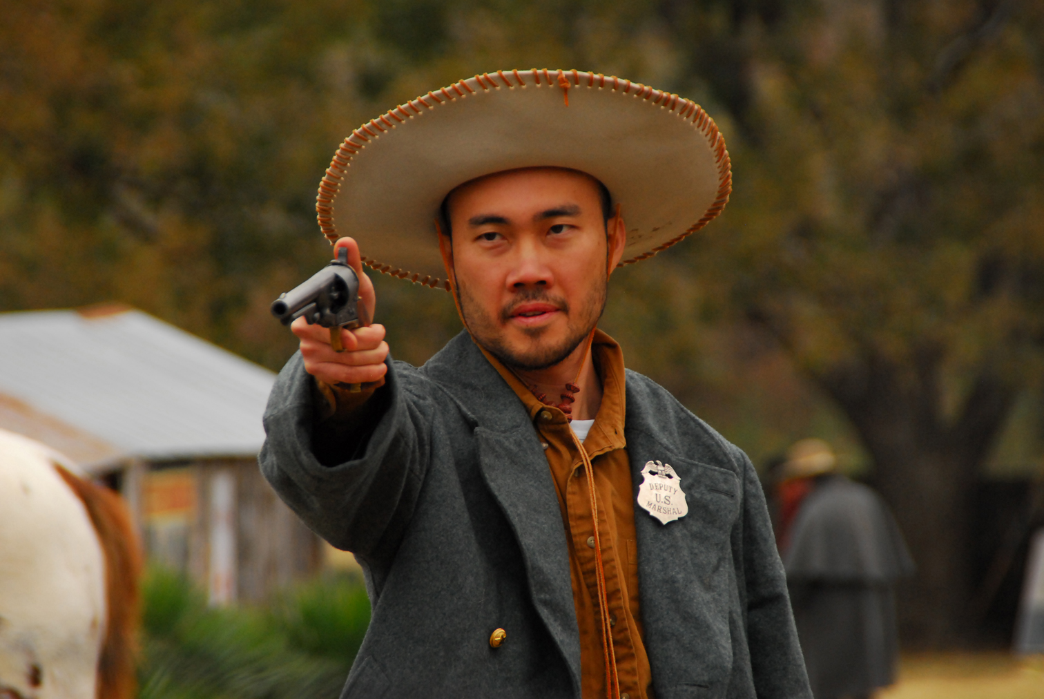 Tze Yep as Sheriff Wang in Platinum Peacemaker