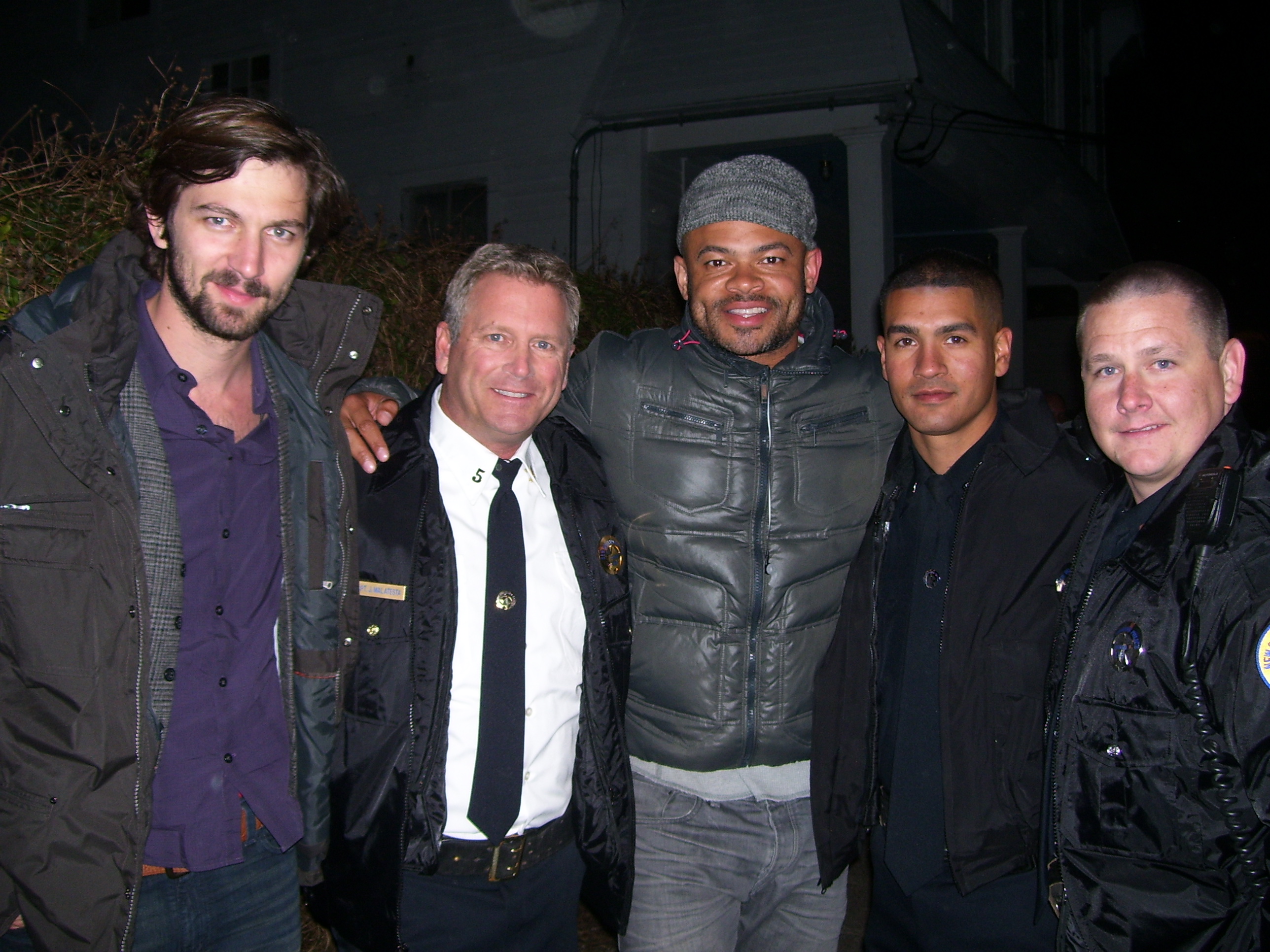 Tony Senzamici as Capt. Jack Malatesta with series regular Michiel Huisman as Sonny, Director Anthony Hemingway and 2 of New Orleans Finest, Police Officers Scott Boyington & Victor Campuzano on the set of the HBO series Treme.