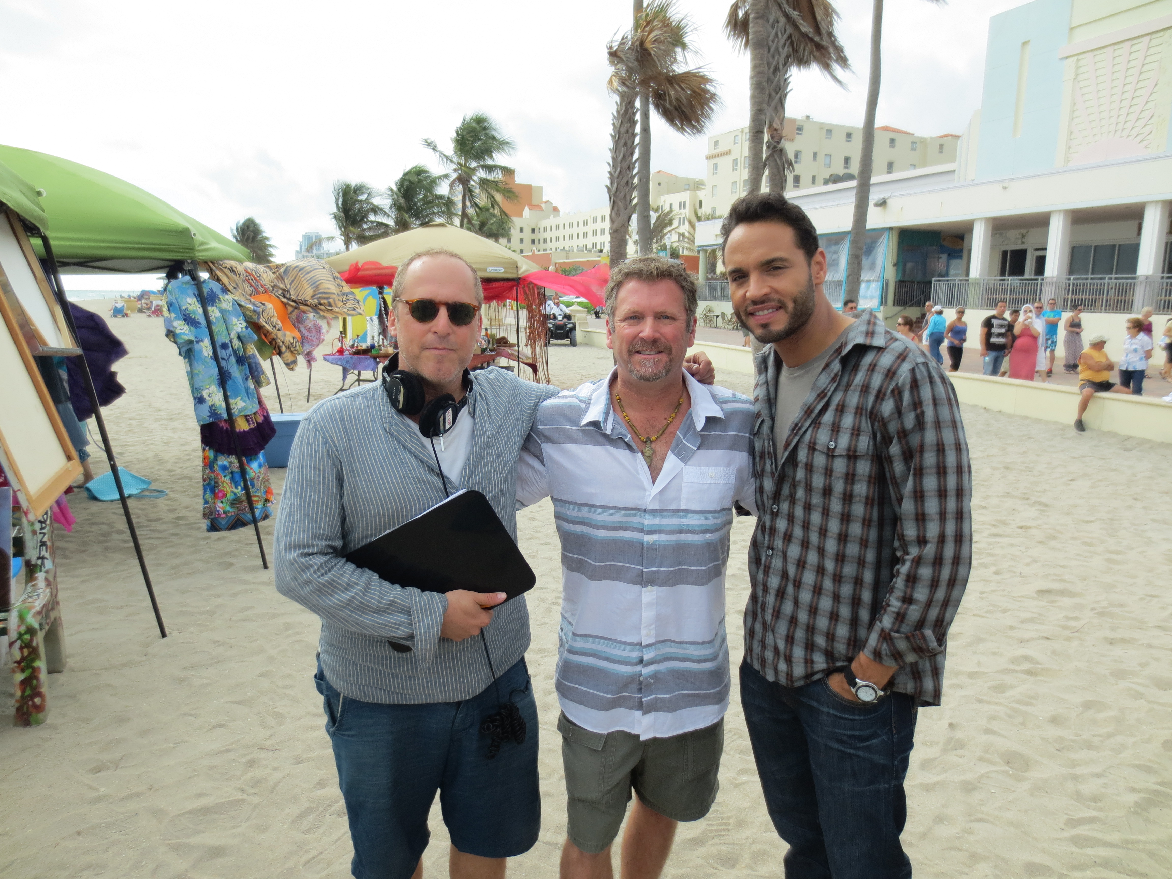 Tony Senzamici on the set of the USA network show Graceland with director Russell Fine and Daniel Sunjata.
