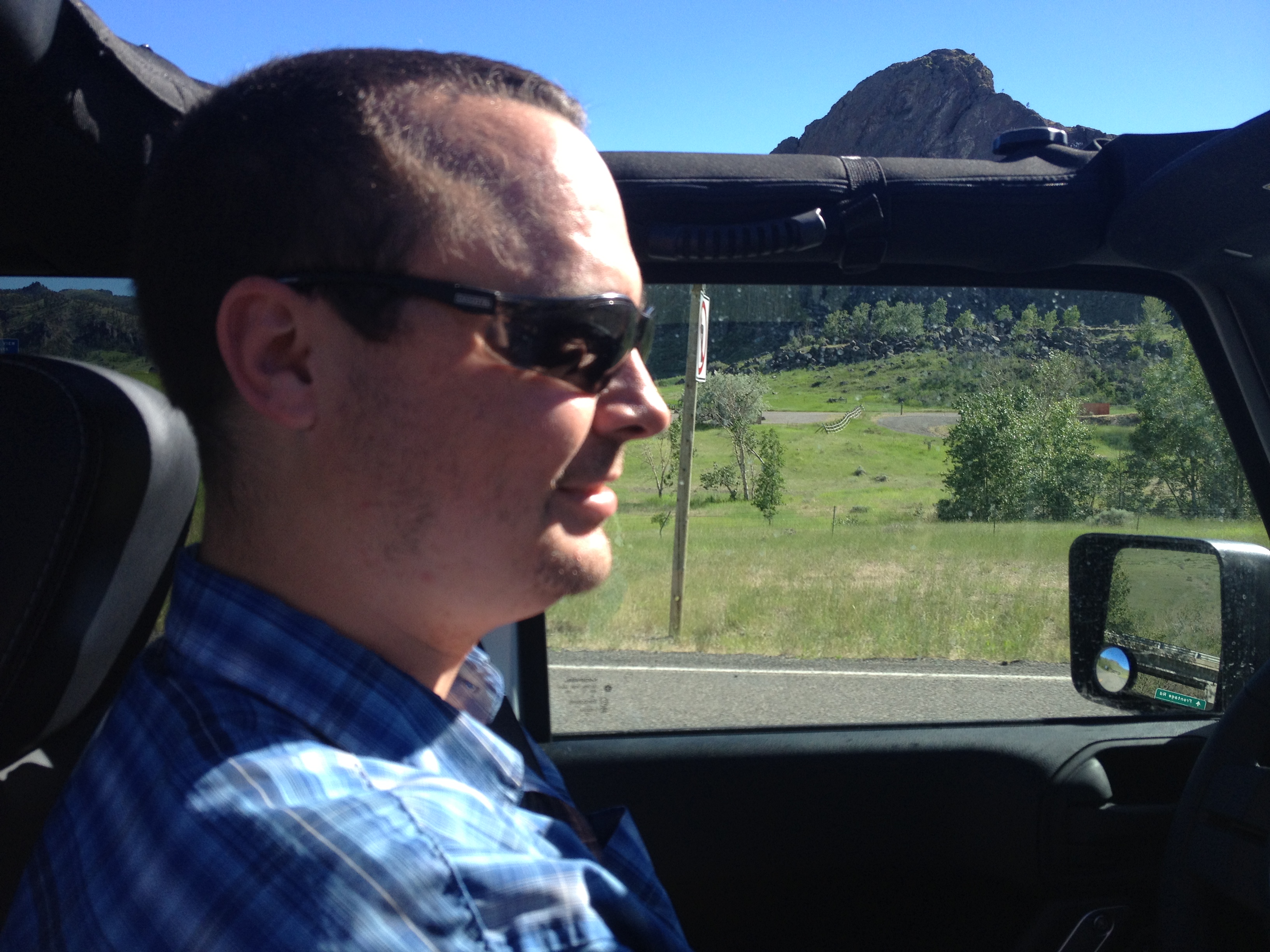 C S Martin driving a Jeep in Cascade, Montana in 2013.