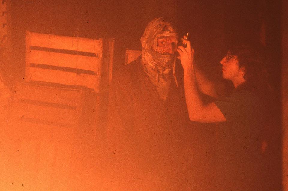 DARKMAN (1990) Tony Gardner touches up actor Liam Neeson as the title character in Sam Raimi's film 