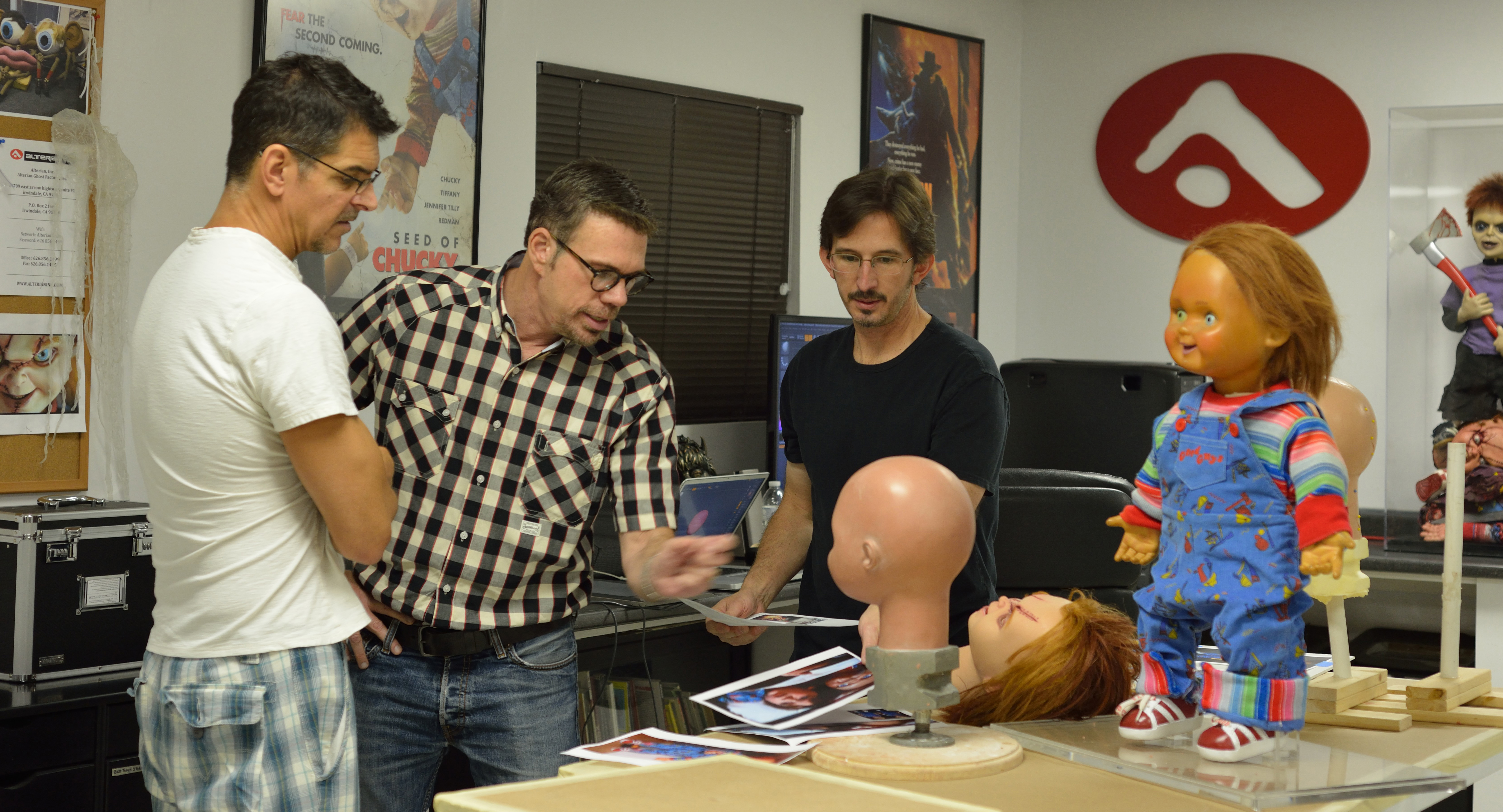 CURSE OF CHUCKY (2013) Writer/Director Don Mancini, Creator/Producer David Kirschner, and Chucky Supervisor/Lead Performer Tony Gardner confer on Chucky's design during pre-production on 