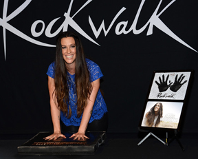 Alanis Morissette at Rockwalk Induction 8-21-2012 with commemorative plaque designed and fabricated by Dreamland-3D.com
