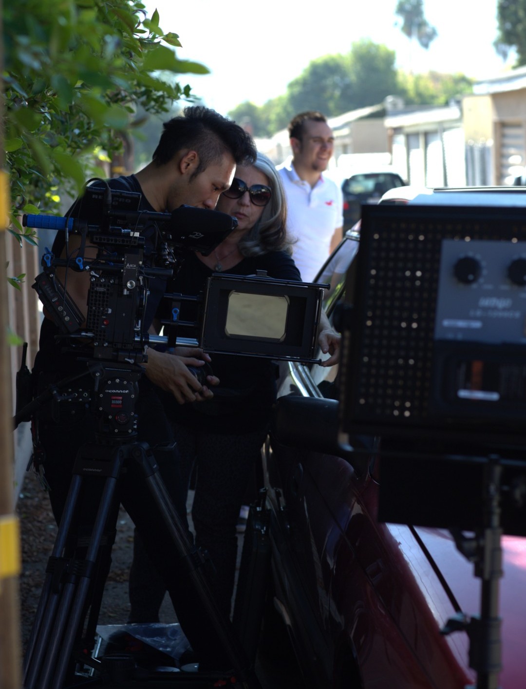 Director Judy Sandra with DP Jon Wong on the set of 