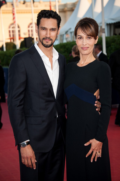 Actress Dolores Chaplin (R) and Stany Coppet arrive at the premiere of the film 'Killing Season' during the 39th Deauville American Film Festival on September 6, 2013 in Deauville, France. (September 5, 2013 - Source: Francois Durand/Getty Imag
