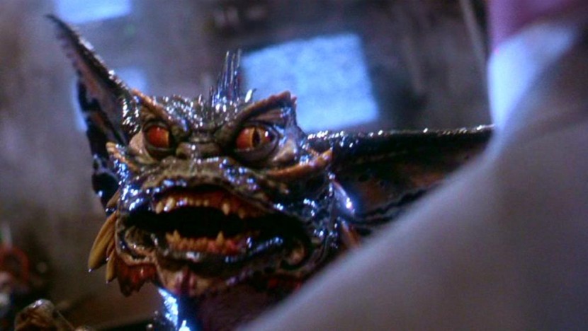 Gremlins 2 (1990) Mohawk. Tim Lawrence: lead puppeteer. About to punch out Archie Hahn in the Clamp Towers control room.