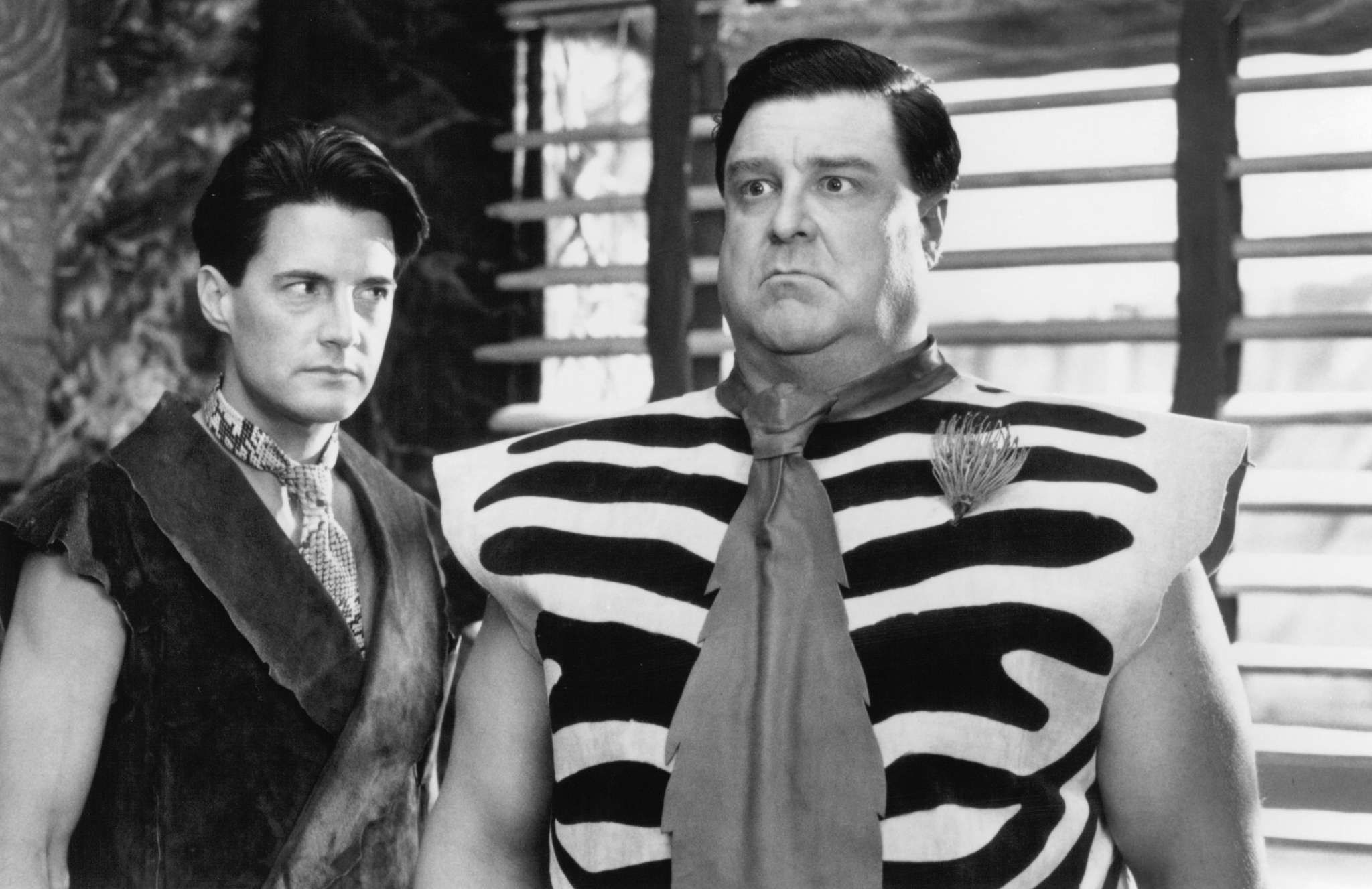 Still of John Goodman and Kyle MacLachlan in The Flintstones (1994)