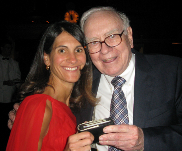 Sharon Abella poses with investor, Warren Buffett at the 