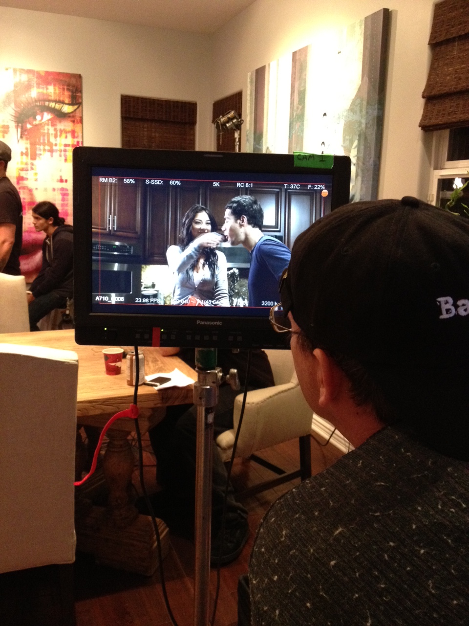 Director: Brandon Thomas checking monitor on set of Doritos commercial.