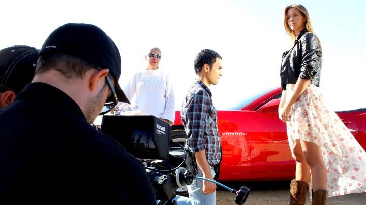 DP Jacob Swanson, actors Joseph Eid and Joni Kempner on set of Camaro spot.