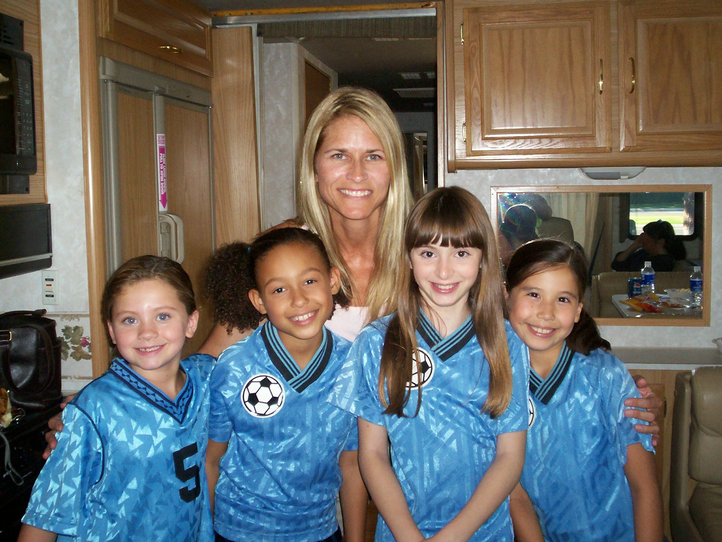 Sami and friends hanging out in the trailer on the Toyota set