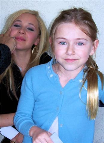 Madison Meyer and Juno Temple having their makeup retouched