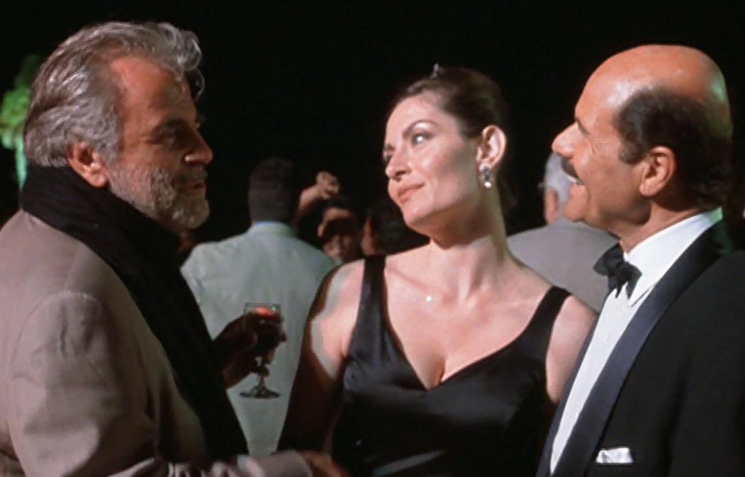 Zack Norman as Kaz Naiman (with Maximilian Schell and Camilla Campanale) in 