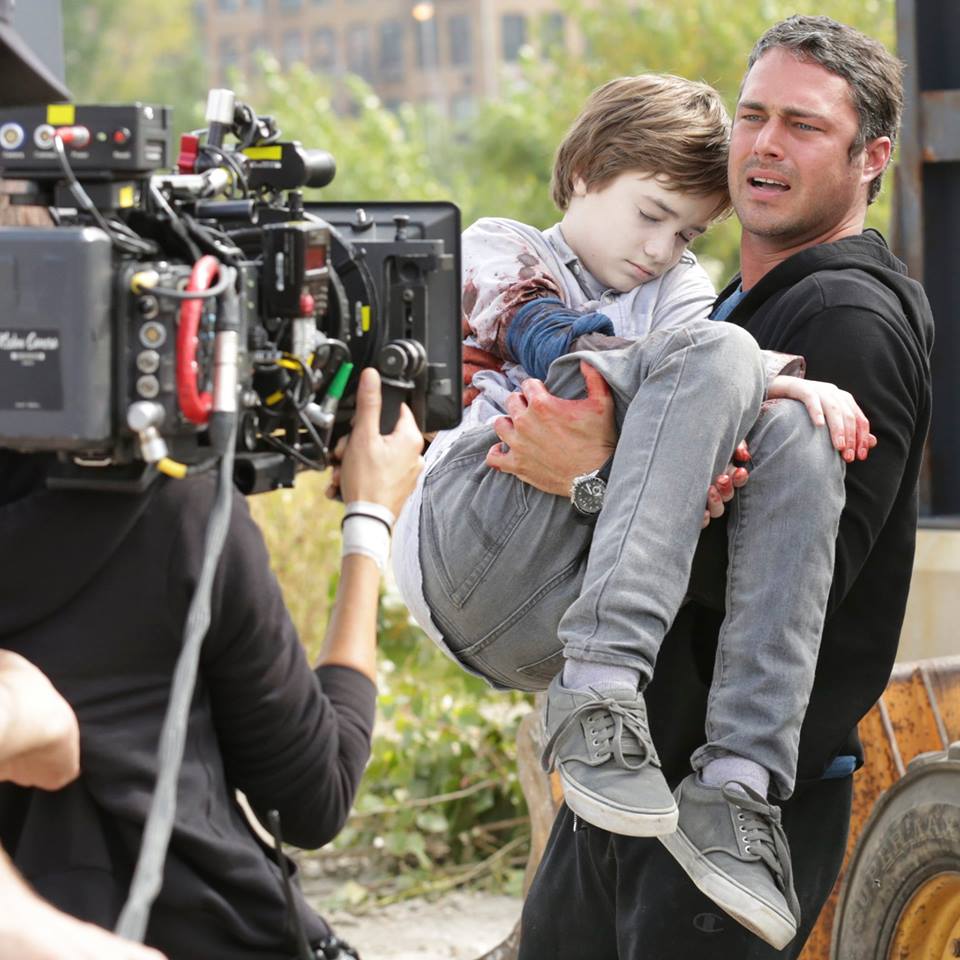 CJ Adams and Taylor Kinney on the set of NBC's Chicago Fire