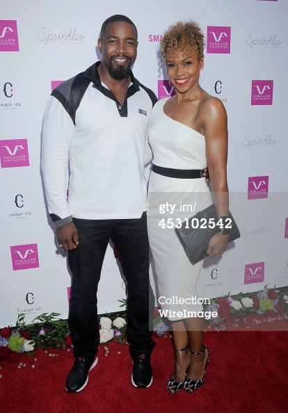 Gillian Waters and fiancee Michael Jai White at Vivica Fox's 50th birthday celebration in Beverly Hills.