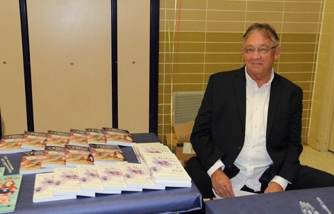 Dennis at Farmington Elementary School ROCK THE READ distribution test Nov 2013.