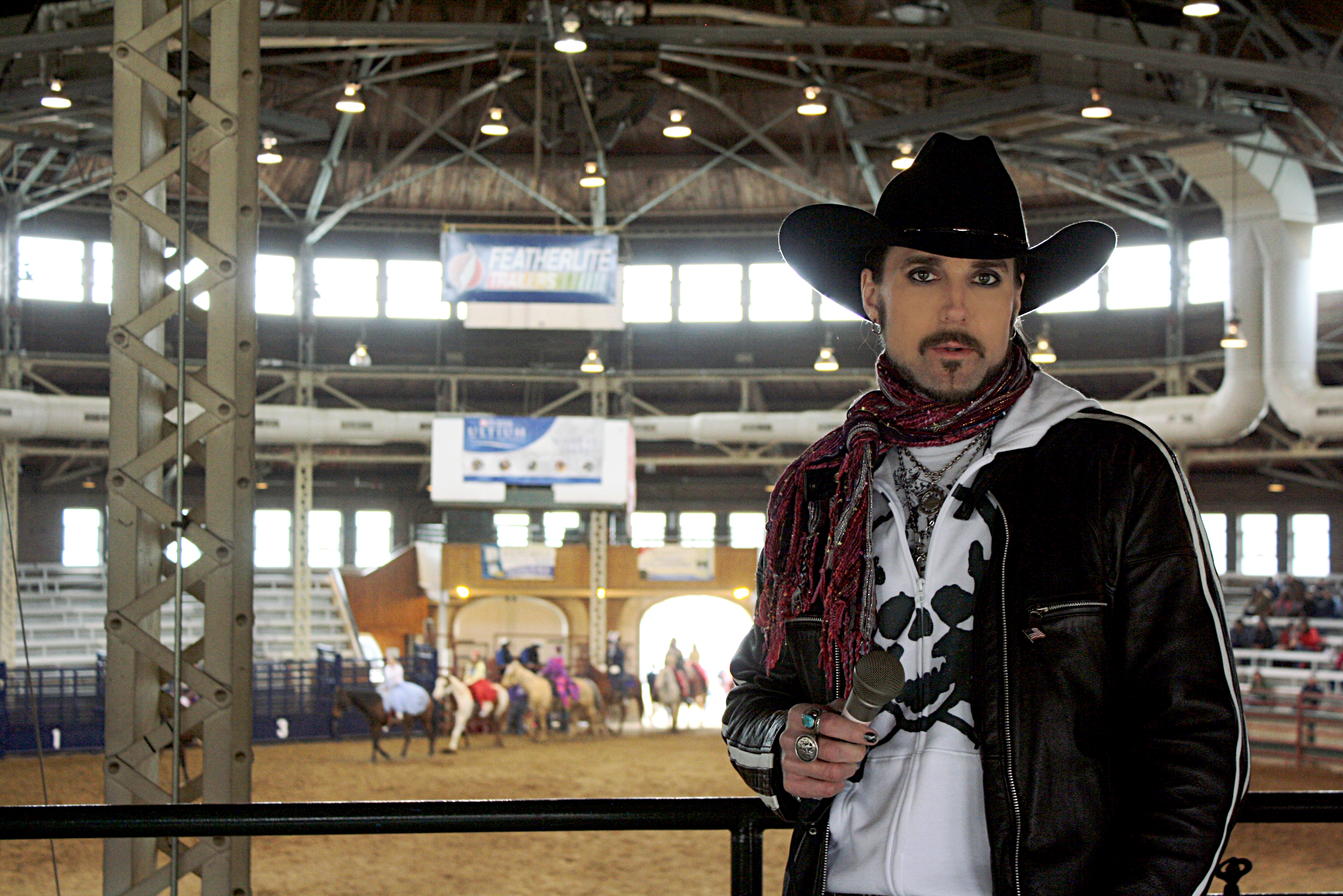 MATT WIGGINS prepares to make comments during an appearance at the annual Horse Fair in Des Moines, IA in April 2014