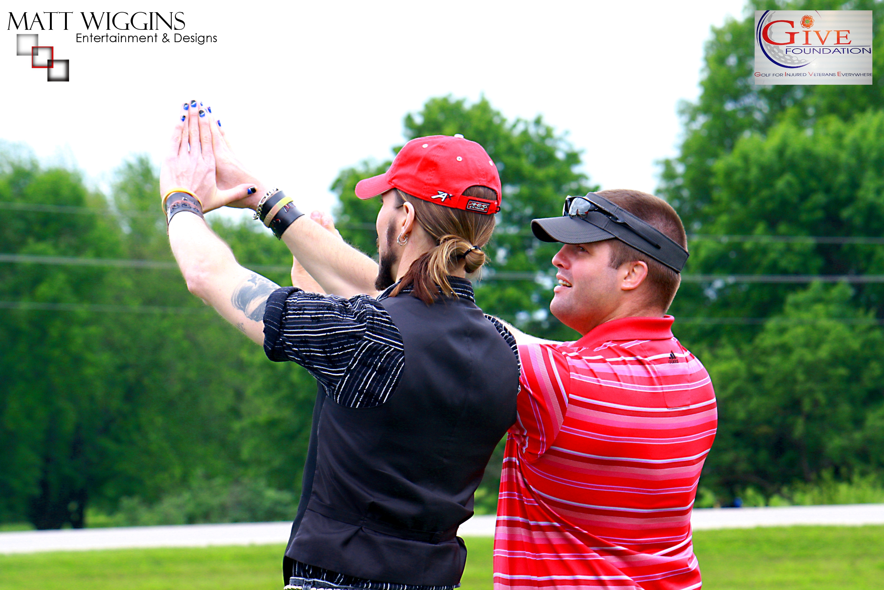 Matt Wiggins receives instruction from PGA pro's during his time with the Golf for Injured Veterans Everywhere program.