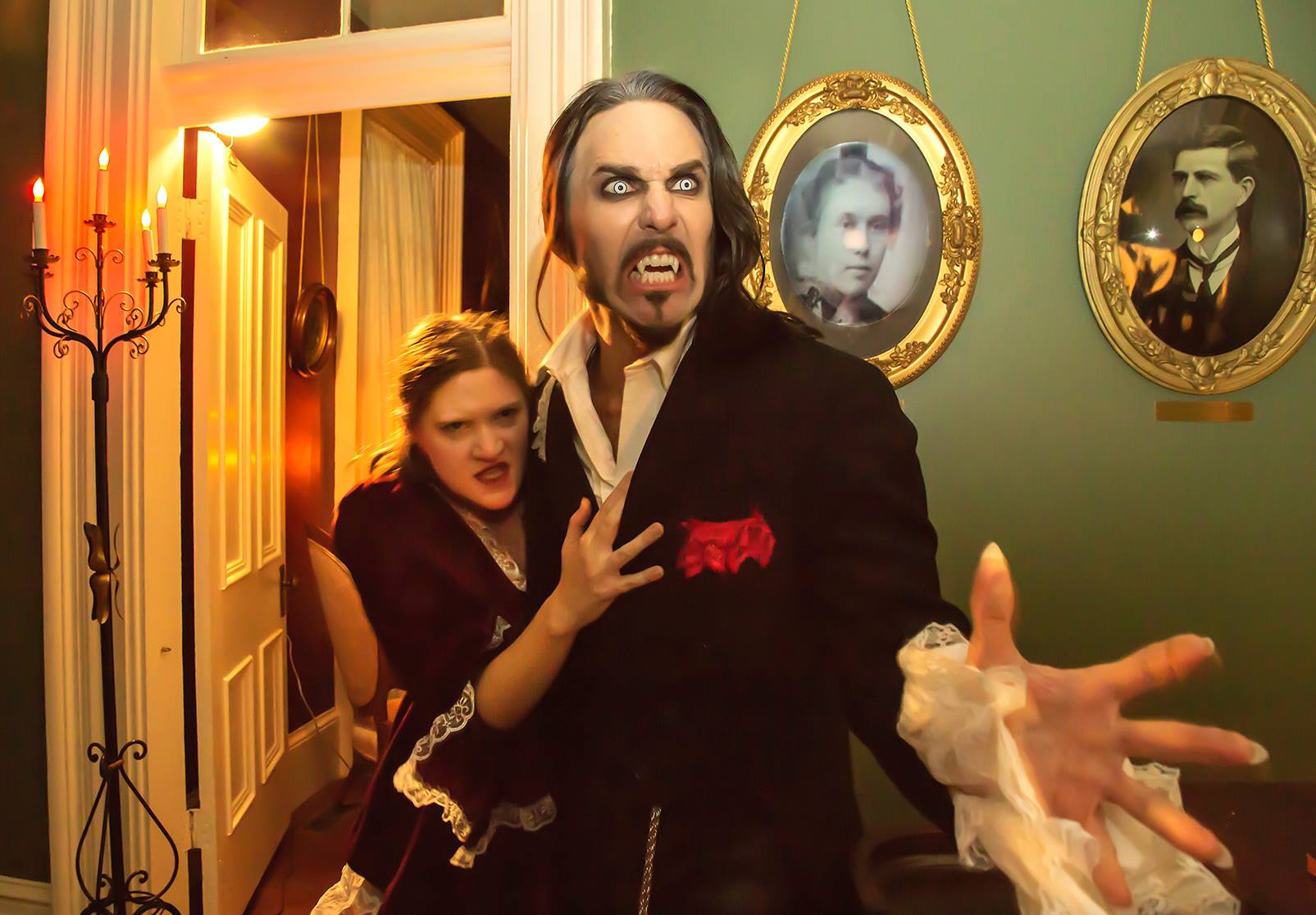 Still of Matt Wiggins as Dracula and cast member from the 2013 live production of Bram Stokers Dracula.