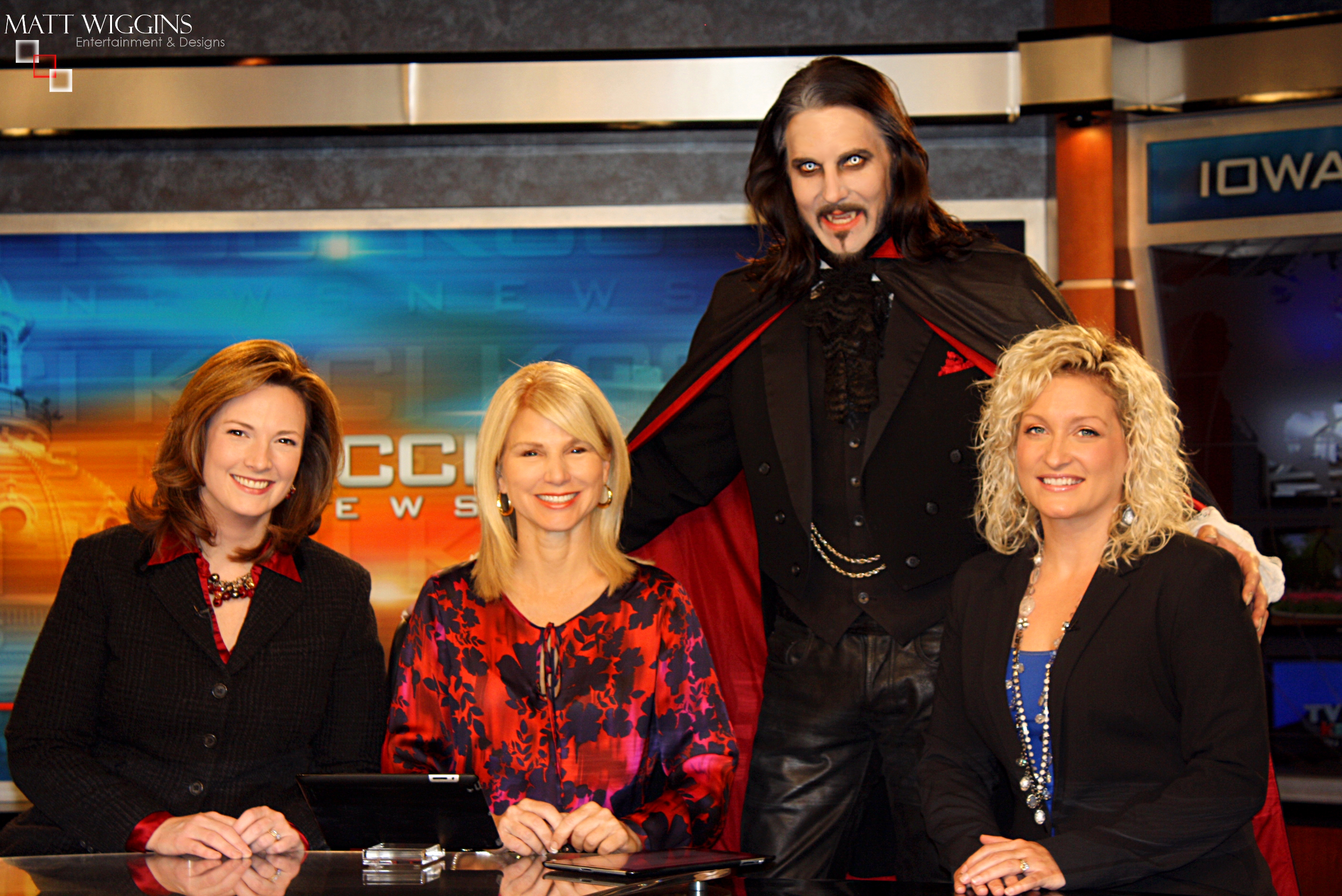 Matt Wiggins with KCCI CH 8 Des Moines News Anchors after appearing in as Dracula in a Live television interview.