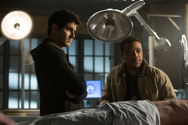 Still of Russell Hornsby and David Giuntoli in Grimm (2011)