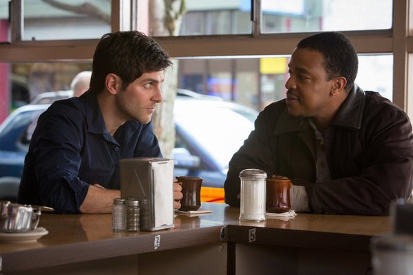 Still of Russell Hornsby and David Giuntoli in Grimm (2011)