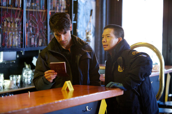 Still of Reggie Lee and David Giuntoli in Grimm (2011)